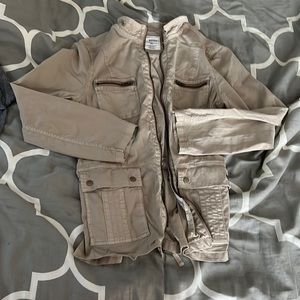 Tan lightweight jacket.